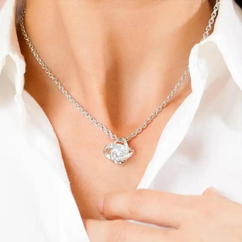 Collier noeud d'amour en or blanc pour fille